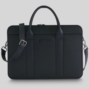 Front view of a black laptop bag with double handles, a detachable shoulder strap, clean stitched panels, and a sleek professional design for office or business travel.