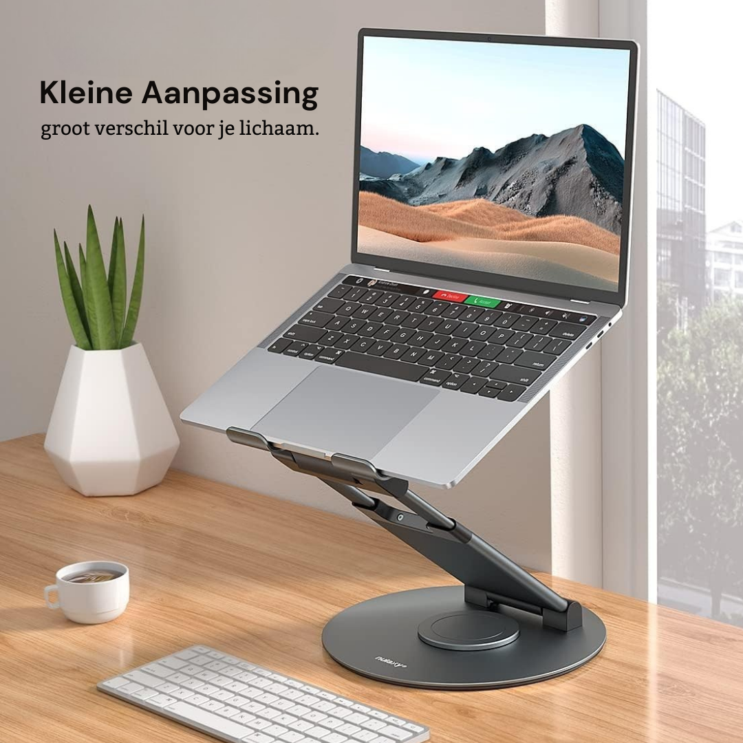 Laptop placed on an ergonomic laptop stand at a home office desk, raising the screen to eye level for improved posture