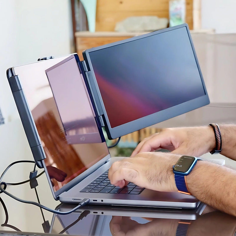 Person working remotely using a 14.1-inch portable monitor dual screen setup attached to a laptop for multitasking and productivity