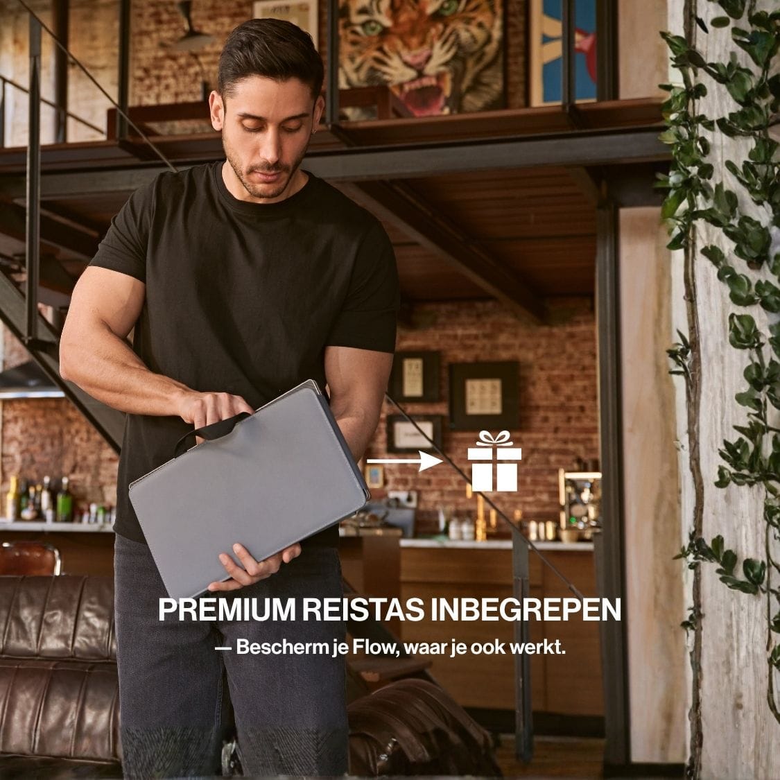 Man placing a folded portable monitor into a protective travel case, showing the compact design for carrying a multi-screen setup on the go.