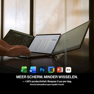 Person using a laptop with two portable monitor screens while working across multiple applications in a spacious three-display workstation.