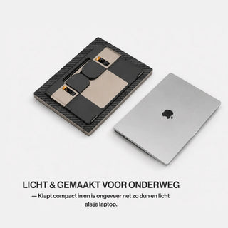 Folded portable monitor beside a MacBook, demonstrating its compact and lightweight design for carrying while travelling.