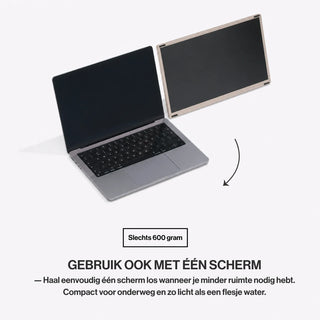 Portable monitor used as a single detachable second screen beside a laptop, highlighting its lightweight 600-gram design for travel.