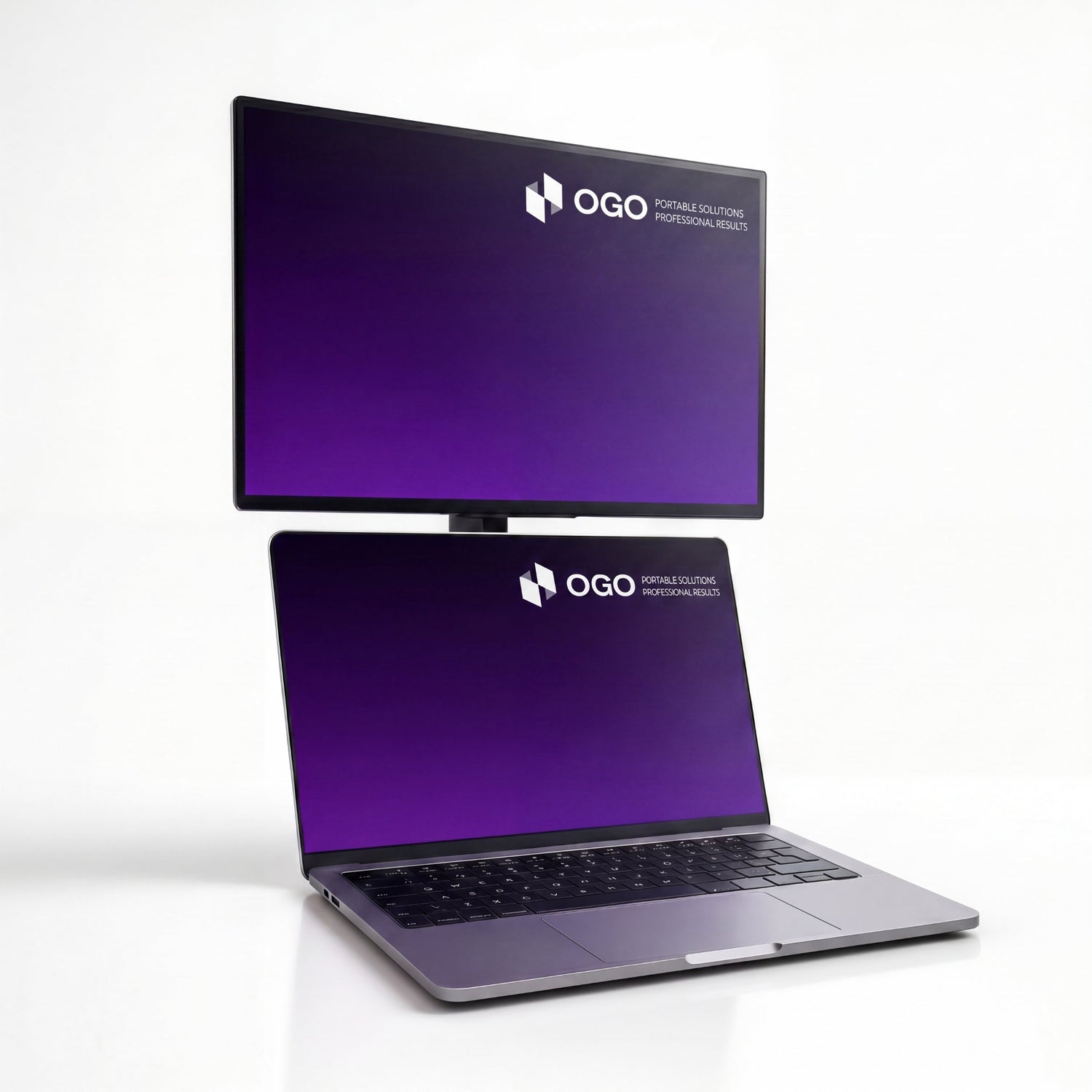 Portable monitor positioned above a laptop to create a vertical dual-screen setup, with both displays showing matching purple OGO screens.