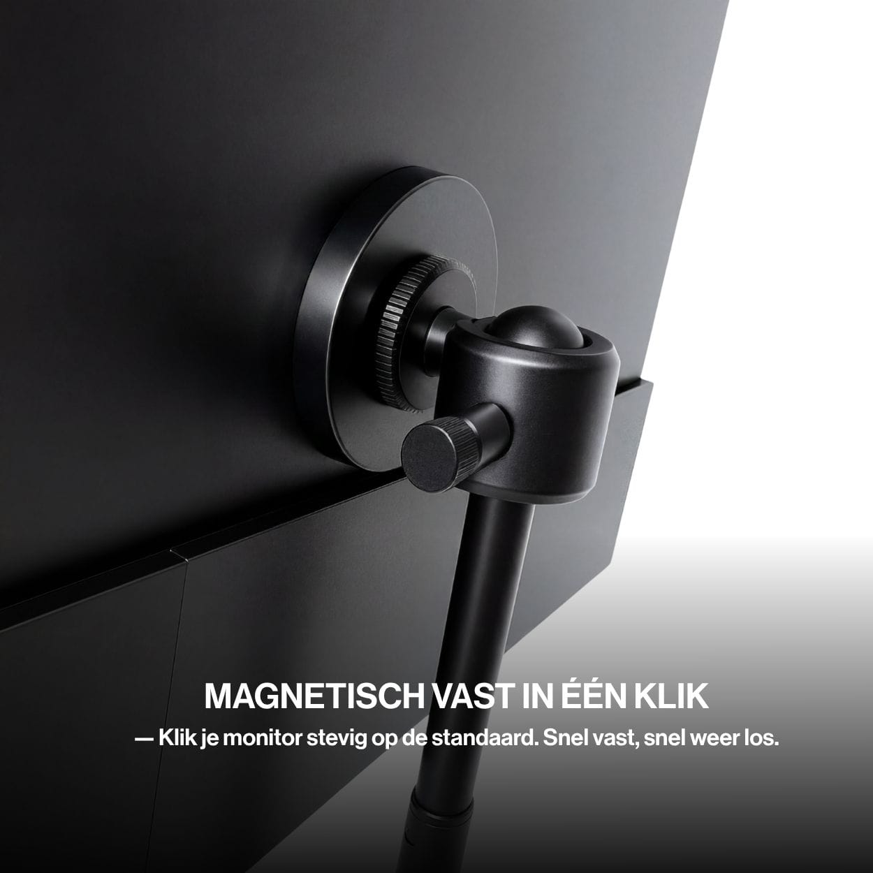 Close-up of the OneSight AMOLED portable monitor securely attached to its adjustable tripod stand with a magnetic mounting system.